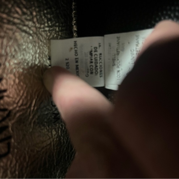 W Capsule Backpack with adjustable straps. Heart print on black material. - Picture 10 of 16